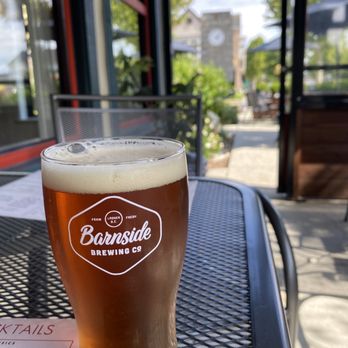 Il Posto - a glass of beer on a table - Italian Near Me - Delta, British Columbia Il Posto - a glass of beer on a table - Italian Near Me - Delta, British Columbia