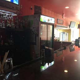 Bar area while we wait for carry-out. Friendly service.  Good drinks.