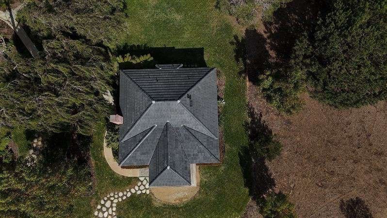 Slide of No Limit Roofing