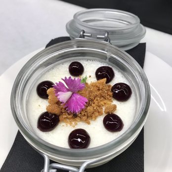 La Gastronómica - Manchego cheese mousse with fruit compote, edible flower, and pie crust crumbs. Unusual, complex, perfectly executed dessert - Mediterranean Near Me - Barcelona, B