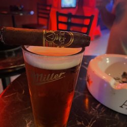 Suite 306 - Very welcoming place, great cigar selection, darts and pool tables.