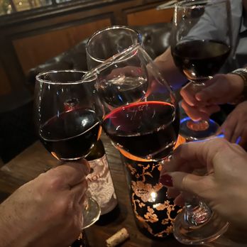 Cafe Fiore - Enjoying wine with friends by the fireplace - Italian Near Me - Ventura, California Cafe Fiore - Enjoying wine with friends by the fireplace - Italian Near Me - Ventura, California