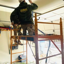 Insulation Commandos of North Atlanta - Drill and Fill in a garage ceiling