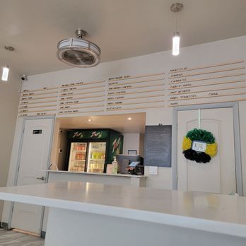 Dirty Tiff's Cafe - a counter with a sign on it - Soul Food Near Me - Chicago, Illinois