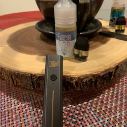Vape Nova - Caliburn Koi with some lovely 50mg fruity menthol juice.