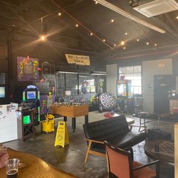 OB’s Cervezaria - Back corner of the main room is a gaming area (incl bags and foosball)