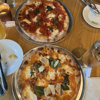 Julien’s Bar - two pizzas on a table - Bars Near Me - Millbrook, New York Julien’s Bar - two pizzas on a table - Bars Near Me - Millbrook, New York