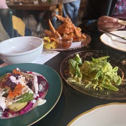 Guacamole w/ smoked yolk and sugar snap peas, chicken wings w/ escabeche, beet salad w/ trout roe Guacamole w/ smoked yolk and sugar snap peas, chicken wings w/ escabeche, beet salad w/ trout roe