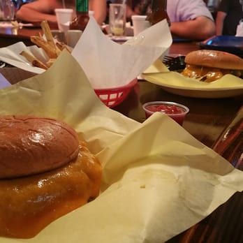 Chris Madrid's - Tostada burger in front.  Jalapeño burger in bk. - Burgers Near Me - San Antonio, Texas