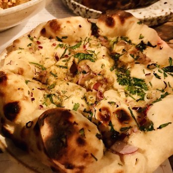 Kricket Soho - Garlic naan - Indian Near Me - London, XGL Kricket Soho - Garlic naan - Indian Near Me - London, XGL