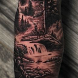 A nature scene with a Viking axe in the foreground.