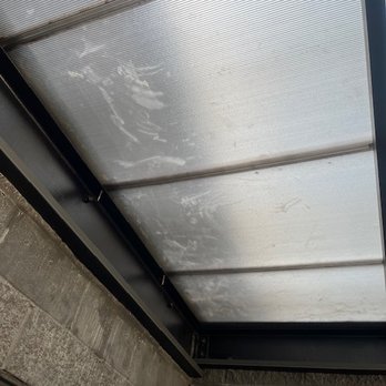 Urban Rooftops - Glue / chemicals left from initial installation.  Rain / natural elements don't remove and I can't access to clean by hand. - Decks & Railing Near Me - Chicago, Illinois