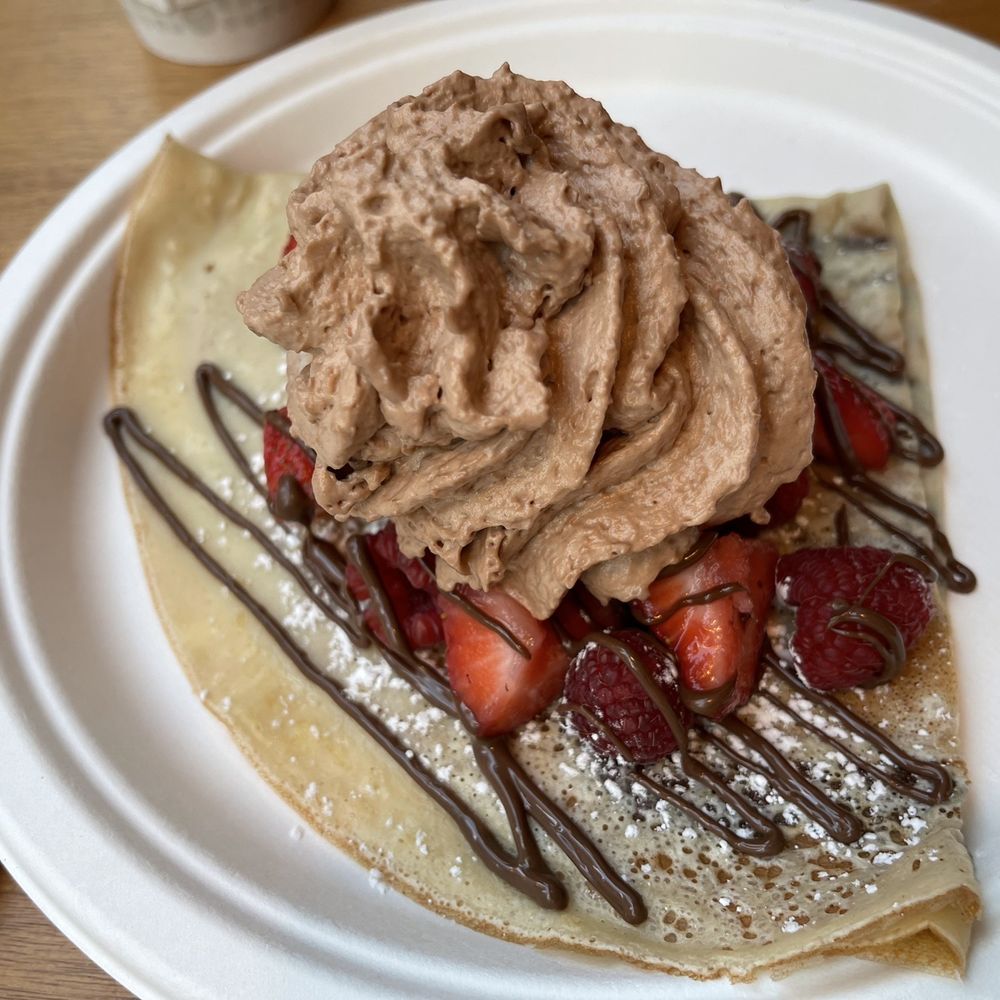 Nutella Cafe - Crepe with Strawberries and Nutella Cream - Desserts Near Me - Chicago, Illinois Nutella Cafe - Crepe with Strawberries and Nutella Cream - Desserts Near Me - Chicago, Illinois