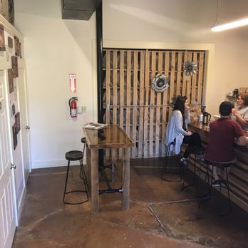 Sospeso Coffee Roasters - people sitting at tables - Coffee Roasteries Near Me - Waxhaw, North Carolina Sospeso Coffee Roasters - people sitting at tables - Coffee Roasteries Near Me - Waxhaw, North Carolina