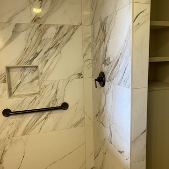Kali Tile - 4'x2' porcelain tile shower with pebble shower floor - Tiling Near Me