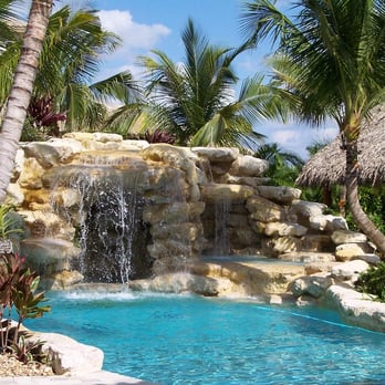 World Class Tree & Landscape Inc - a pool with a waterfall - Landscaping Near Me - Jupiter, Florida World Class Tree & Landscape Inc - a pool with a waterfall - Landscaping Near Me - Jupiter, Florida