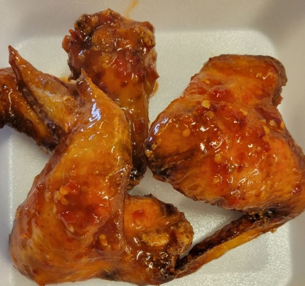 Mae Khan's Eggrolls and things Logo