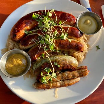 Ludwig's Biergarten - Feast for Two Sausage Plate: Jalapeño cheese, Bavarian, Thüringer, Chicken Spinach, and Nürnberger sausages - German Near Me - Mountain View, California Ludwig's Biergarten - Feast for Two Sausage Plate: Jalapeño cheese, Bavarian, Thüringer, Chicken Spinach, and Nürnberger sausages - German Near Me - Mountain View, California