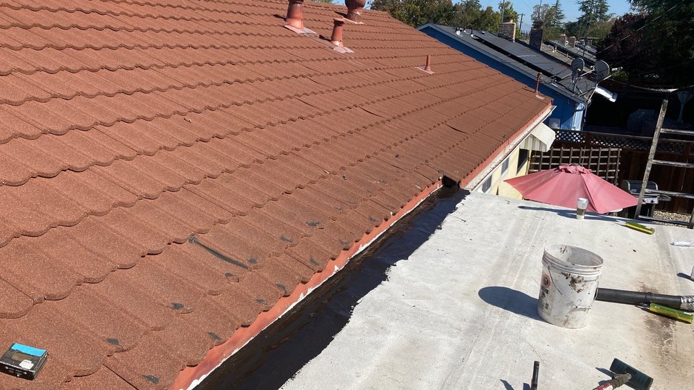 Slide of Eastman Roofing & Waterproofing