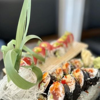Red plum - a plate of sushi on a table - Japanese Near Me - Sarasota, Florida Red plum - a plate of sushi on a table - Japanese Near Me - Sarasota, Florida