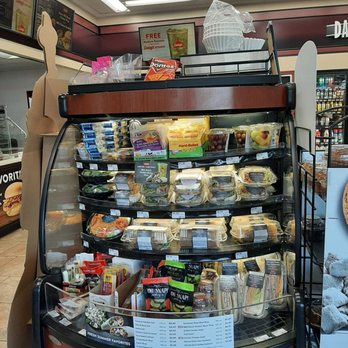 Casey's - a display of cheeses and other foods - Pizza Near Me - Clear Lake, Iowa