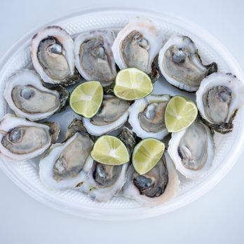 Mariscos El Sinaloco - a plate of oysters with lime wedges - Seafood Near Me - Phoenix, Arizona