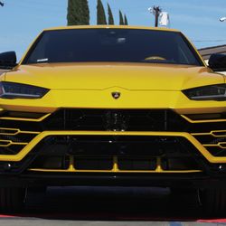 Photo of Sticker City - Sherman Oaks, CA, US. Xpel Ultimate Plus on yellow Lamborghini Urus.