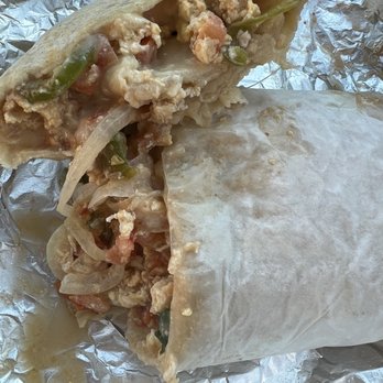Lily's Malibu - Pancho Breakfast Burrito: Peppers, onions, tomatoes, beans, eggs, cheese... needs POTATOES! Otherwise good and messy. - Burgers Near Me - Malibu, California Lily's Malibu - Pancho Breakfast Burrito: Peppers, onions, tomatoes, beans, eggs, cheese... needs POTATOES! Otherwise good and messy. - Burgers Near Me - Malibu, California