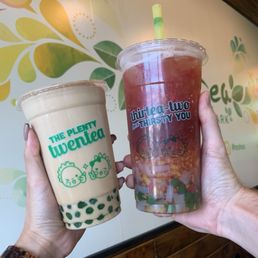 Jasmine milk tea with honey Boba and peach me sweetie with coconut jelly and honey Boba