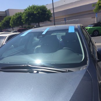 Low Price Auto Glass - The finished product. Was given clear instructions to not remove the tape for 24hrs. I'm very satisfied with Low Price Auto Glass. - Auto Glass Services Near Me - Moreno Valley, California Low Price Auto Glass - The finished product. Was given clear instructions to not remove the tape for 24hrs. I'm very satisfied with Low Price Auto Glass. - Auto Glass Services Near Me - Moreno Valley, California