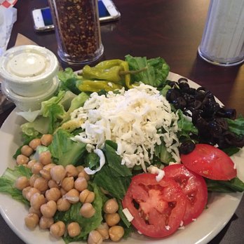 Ali's Pizzaria - Delicious & fresh side salad w/ Garbanzos and ranch dressing - Pizza Near Me - Windcrest, Texas
