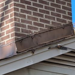 Rivas Masonry and Restoration - Shoddy flashing work.