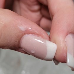 La Belle Facial & Nails Spa - Another cut from over filing, acrylic left on my nail, and you can see my cuticle cut as well.