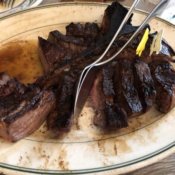 Peter Luger - Peter Luger's Porterhouse Cooked Pittsburgh - Steakhouses Near Me - Brooklyn, New York