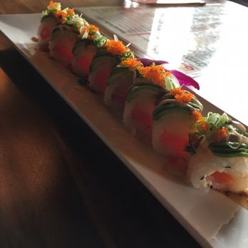 Sushi One Spot - One Spot roll (tuna, salmon, yellowtail wrapped with soy paper, avocado, smelt roe, green onion on top) - Sushi Bars Near Me - Montclair, California Sushi One Spot - One Spot roll (tuna, salmon, yellowtail wrapped with soy paper, avocado, smelt roe, green onion on top) - Sushi Bars Near Me - Montclair, California