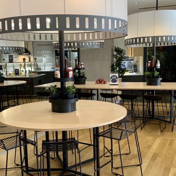 SAS Business Lounge - Circular high top seating area - Airport Lounges Near Me - Newark, New Jersey
