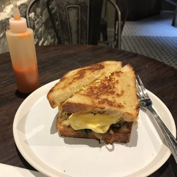 C&B - Mushroom and Egg Sandwich Breakfast plus their house made hot sauce! - Coffee & Tea Near Me - New York, New York C&B - Mushroom and Egg Sandwich Breakfast plus their house made hot sauce! - Coffee & Tea Near Me - New York, New York