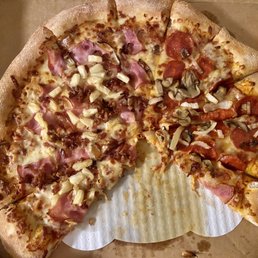 XL pizza (half pineapple ham and bacon/half pepperoni mushroom and onion) - 12 slices. 12 very unevenly cut slices.