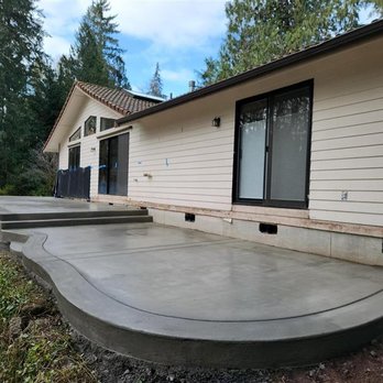 Sam The Concrete Man Spokane - Curved and raised concrete patio - Masonry/Concrete Near Me - Spokane, Washington Sam The Concrete Man Spokane - Curved and raised concrete patio - Masonry/Concrete Near Me - Spokane, Washington