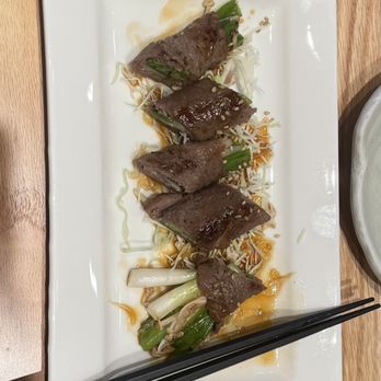 NOA Sushi - Enoki mushrooms and green onion wrapped in kobe meat - Japanese Near Me - Beaverton, Oregon