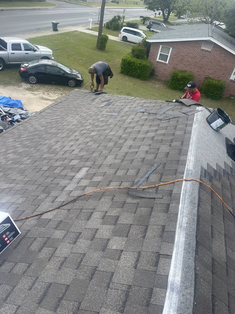 Slide of TNW Roofing