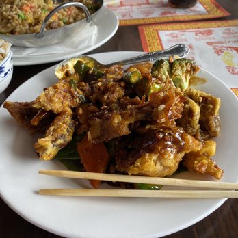 China Restaurant - Duck Almond with steamed rice and combination rice in the background. - Chinese Near Me - Harlingen, Texas