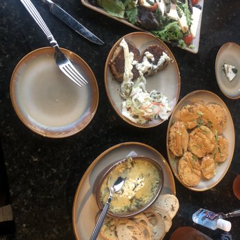 Curio Bistro - Gulf Fish Cakes, spinach artichoke dip, fried green tomatoes, iced tea - Cajun/Creole Near Me - New Orleans, Louisiana
