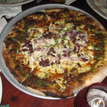 Jupiter - IO pizza - pesto sauce, roasted chicken breast, red onions, kalamata olives, mozzarella - Pizza Near Me - Berkeley, California Jupiter - IO pizza - pesto sauce, roasted chicken breast, red onions, kalamata olives, mozzarella - Pizza Near Me - Berkeley, California