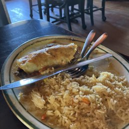 Beef enchilada and rice. Beef enchilada and rice.