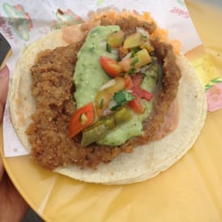 Tacos Varios - Taco de milanesa, con su salsa de guacamole y nopalitos con tomate.