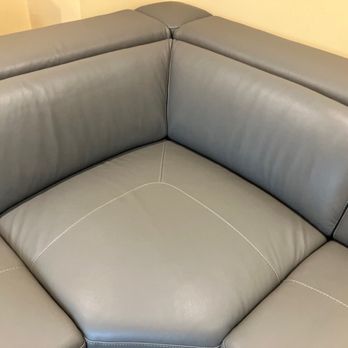 Ashley Store - The wedge piece..the leather is all pulled and wrinkled. - Furniture Stores Near Me - Orion, Michigan
