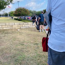 Waiting line outside the social security office at a 105 degrees texas weather in the summer of 2022