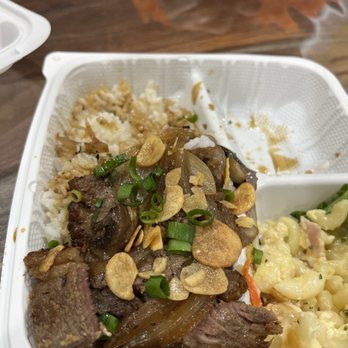 U Kitchen - Garlic steak (it filled the length of the plate but we ate some before taking photo). - Japanese Near Me - Honolulu, Hawaii