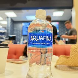 $8 bottles water? That's just messed up. My fault for not noticing the price, but your fault for making me feel stupid.
